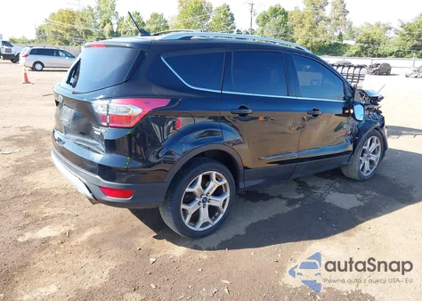 2018 Ford Escape Titanium z USA, uszkodzony, nr VIN 1FMCU0J91JUA20004
